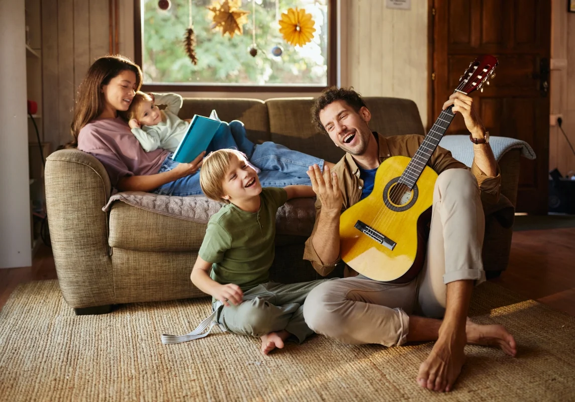 Family enjoying music at home